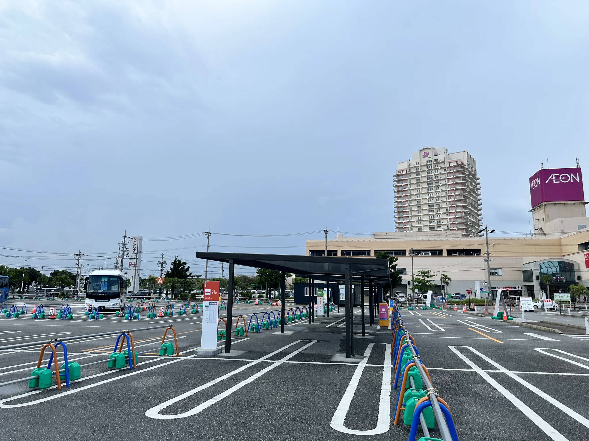 Covered bus bays at Chatan Gateway with AEON Chatan behind