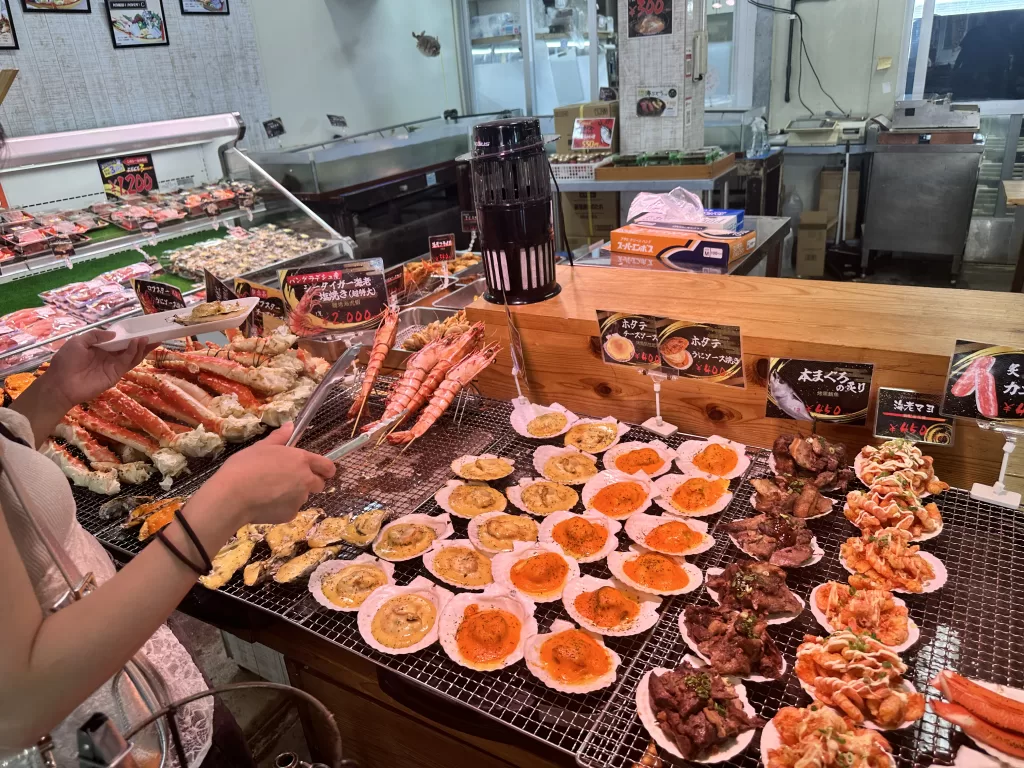 Grill counter with scallops, king crab legs and giant shrimp