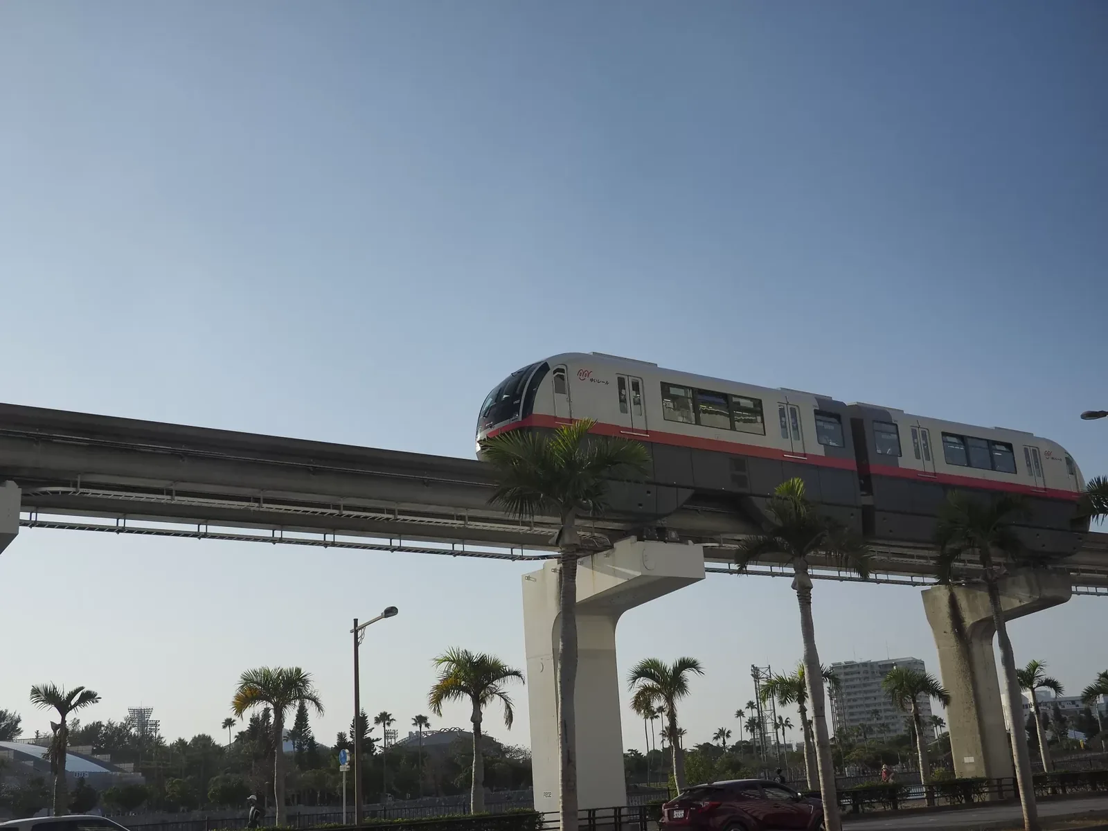 A Yui Rail monorail train on the elevated track in Naha